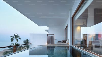 Riff - Modern poolside terrace with ocean views at sunset, palm trees visible