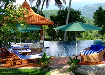 Clingendael Boutique-Hotel, Kandy - infinity pool with wooden deck, umbrellas and loungers, mountain views