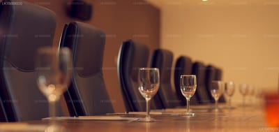 Heritance Negombo - empty wine glasses lined up on dining table with chairs