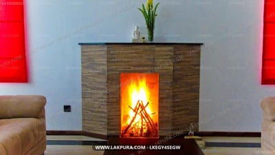 Villa Cassandra - modern fireplace with glowing flames and wood-brick surround