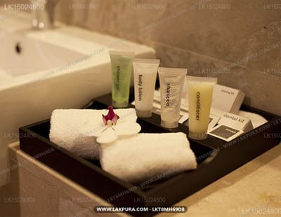 Ramada - hotel bathroom toiletries set with towels and complimentary products