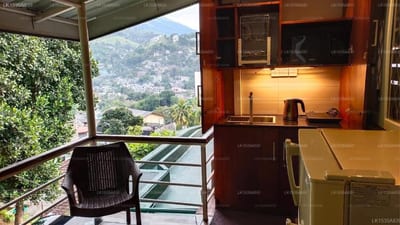 Marvel Hills - open-air balcony with mountain views and modern kitchen area
