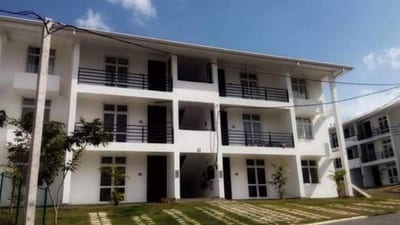 Scenic Range Apartment Kandy - white modern apartment building with balconies and manicured lawn