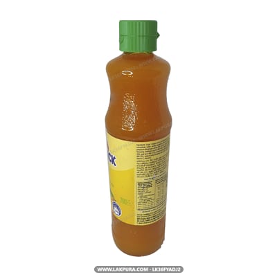 Sunquick Mango - bottle with green cap and yellow label, front view